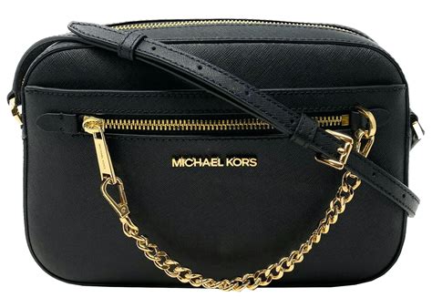 michael kors crossbody clutch black silver|Michael Kors gold evening bag.